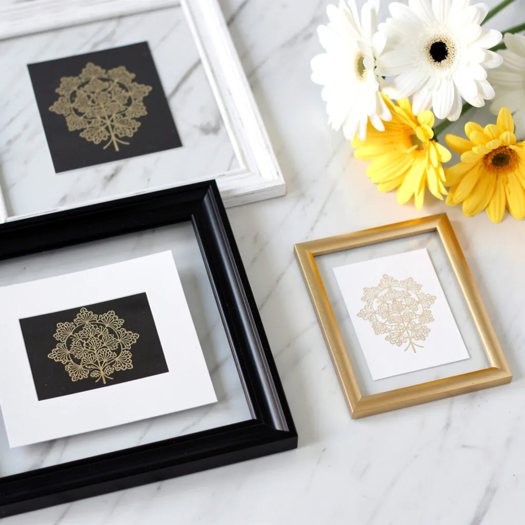 Black and Gold Gallery Wall Ideas With Mixed Frame Sizes